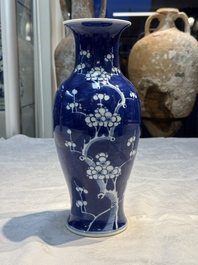 Three Chinese blue and white vases, one covered, Kangxi mark, 19th C. and later