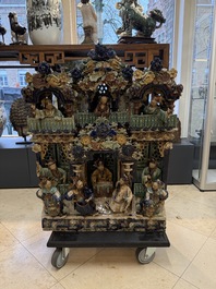 A large and fine Chinese polychrome-glazed Shiwan stoneware group of immortals, 19th C.
