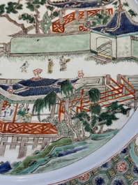 A Chinese famille verte 'Pavilions and Lotus Pond' dish, swastika mark, Kangxi