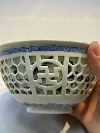 A Chinese blue and white reticulated double-walled 'Swastika' bowl, Kangxi