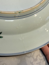 A Chinese famille verte 'Elegant Ladies and Playing Boys' dish, Chenghua mark, Kangxi