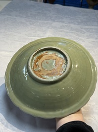 A Chinese Longquan celadon plate with incised floral design, Ming