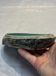 A pair of Chinese turquoise-glazed ducks and a pair of verte biscuit quail-form covered boxes, 20th C.