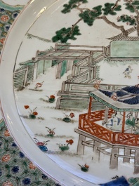 A Chinese famille verte 'Pavilions and Lotus Pond' dish, swastika mark, Kangxi