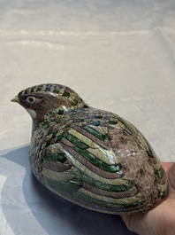 A pair of Chinese turquoise-glazed ducks and a pair of verte biscuit quail-form covered boxes, 20th C.
