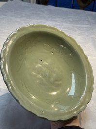 A Chinese Longquan celadon plate with incised floral design, Ming