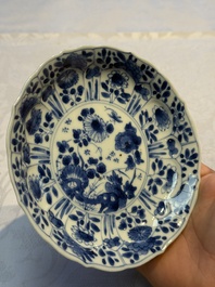 Nine Chinese blue and white cups and 12 saucers, Kangxi