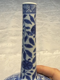 A rare Chinese 'G-marked' blue and white bottle vase with floral design, Kangxi