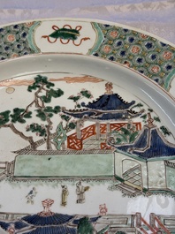 A Chinese famille verte 'Pavilions and Lotus Pond' dish, swastika mark, Kangxi