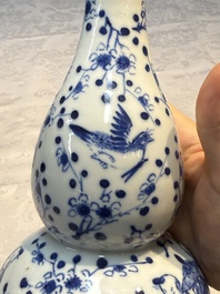 Three Chinese blue and white vases, one covered, Kangxi mark, 19th C. and later