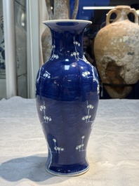 Three Chinese blue and white vases, one covered, Kangxi mark, 19th C. and later