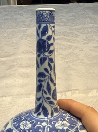 A rare Chinese 'G-marked' blue and white bottle vase with floral design, Kangxi