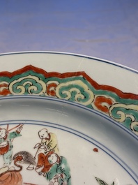 A Chinese famille verte 'Elegant Ladies and Playing Boys' dish, Chenghua mark, Kangxi