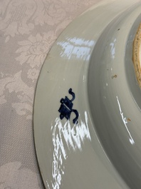 A pair of large Chinese blue and white 'Peacock Border' chargers with floral design, Kangxi