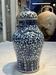 Three Chinese blue and white vases, one covered, Kangxi mark, 19th C. and later