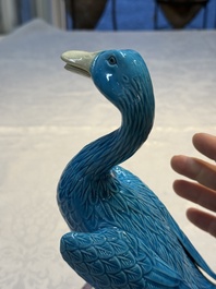 A pair of Chinese turquoise-glazed ducks and a pair of verte biscuit quail-form covered boxes, 20th C.