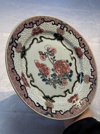 Four Chinese famille rose plates and a dish with floral design, Yongzheng/Qianlong