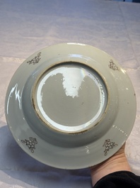 Four Chinese famille rose plates and a dish with floral design, Yongzheng/Qianlong