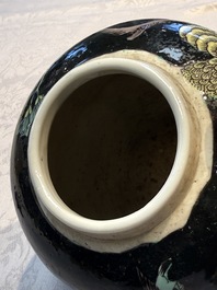 A Chinese verte biscuit black-ground vase and a covered jar, Xuande and Kangxi mark, 19th C.