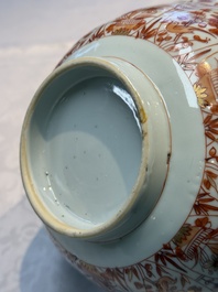 A pair of Chinese  iron-red and gilt-decorated 'Elegant Ladies and Tulips' bowls and covers, Kangxi