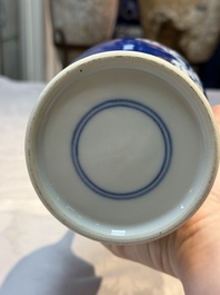 Three Chinese blue and white vases, one covered, Kangxi mark, 19th C. and later