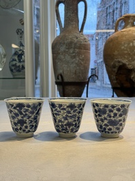 Nine Chinese blue and white cups and 12 saucers, Kangxi