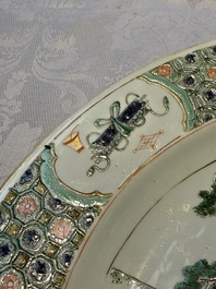 A Chinese famille verte 'Pavilions and Lotus Pond' dish, swastika mark, Kangxi