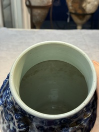 Three Chinese blue and white vases, one covered, Kangxi mark, 19th C. and later