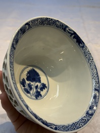 A Chinese blue and white reticulated double-walled 'Swastika' bowl, Kangxi