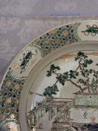A Chinese famille verte 'Pavilions and Lotus Pond' dish, swastika mark, Kangxi