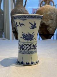 A Chinese blue and white 'Gu' vase with birds among flowering branches, Jiajing mark, 19th C.