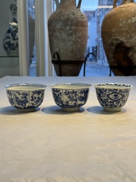 Nine Chinese blue and white cups and 12 saucers, Kangxi