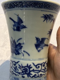 A Chinese blue and white 'Gu' vase with birds among flowering branches, Jiajing mark, 19th C.