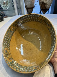 A Chinese famille rose 'Millefleurs' plate, a 'Dragons' plate, and a Nanking famille verte caf&eacute;-au-lait-ground bowl, Qianlong marks, 19/20th C.