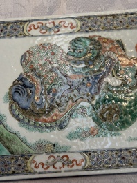 A Chinese famille verte 'Buddhist Lions' plaque, 19th C.