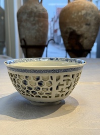 A Chinese blue and white reticulated double-walled 'Swastika' bowl, Kangxi