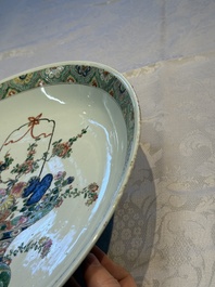 A Chinese famille verte 'Flower Basket' dish, lozenge mark, Kangxi