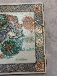 A Chinese famille verte 'Buddhist Lions' plaque, 19th C.