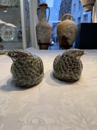 A pair of Chinese turquoise-glazed ducks and a pair of verte biscuit quail-form covered boxes, 20th C.
