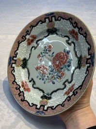 Four Chinese famille rose plates and a dish with floral design, Yongzheng/Qianlong