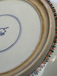 A Chinese famille verte 'Flower Basket' dish, lozenge mark, Kangxi