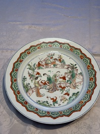 A Chinese famille verte 'Elegant Ladies and Playing Boys' dish, Chenghua mark, Kangxi