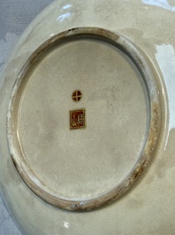 A Japanese Satsuma plate and a vase with figural design, Kozan 光山 and Ryokuzan 祿山 mark, Meiji, 19th C.