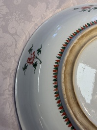 A Chinese famille verte 'Flower Basket' dish, lozenge mark, Kangxi