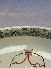 A Chinese famille verte 'Flower Basket' dish, lozenge mark, Kangxi