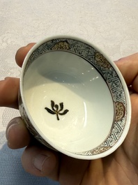 A Chinese gilt-decorated black-enamelled 'Antiquities' cup, Yongzheng/Qianlong