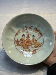 A pair of Chinese  iron-red and gilt-decorated 'Elegant Ladies and Tulips' bowls and covers, Kangxi