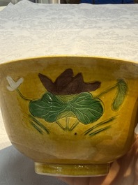 A rare pair of Chinese sancai yellow-ground 'Brinjal' bowls, Tianqi mark, 19th C.
