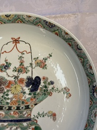 A Chinese famille verte 'Flower Basket' dish, lozenge mark, Kangxi
