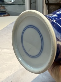 Three Chinese blue and white vases, one covered, Kangxi mark, 19th C. and later